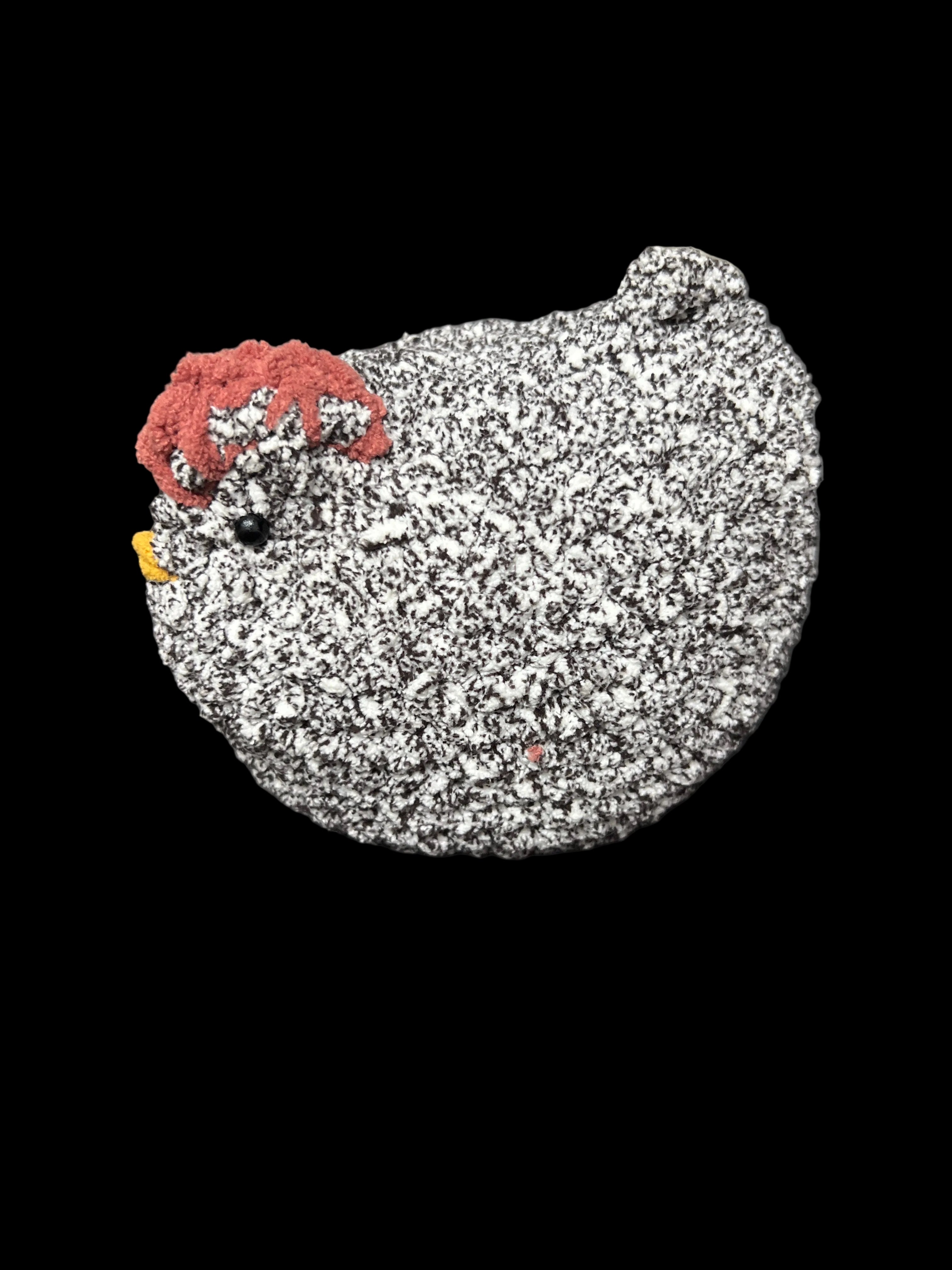 Crocheted chicken in nest