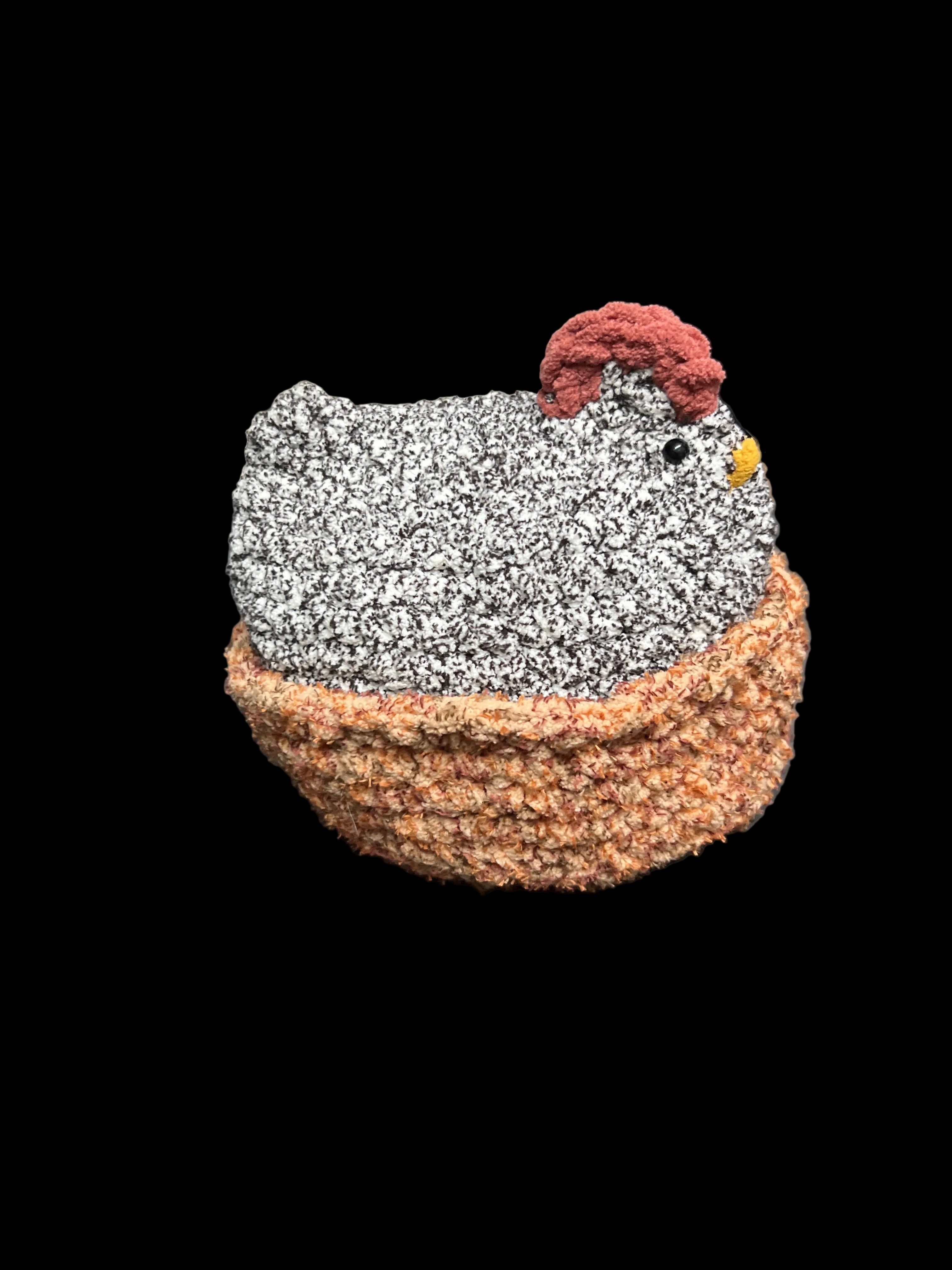 Crocheted chicken in nest